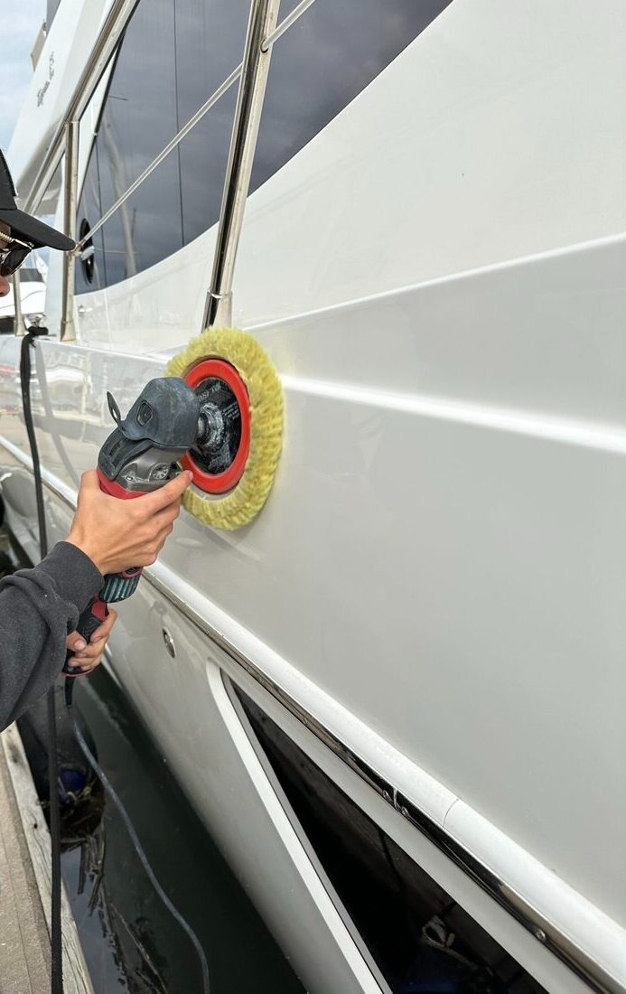 Swift Marine Employee Polishing a Yacht